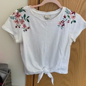 Floral white tee with cute tie at the bottom